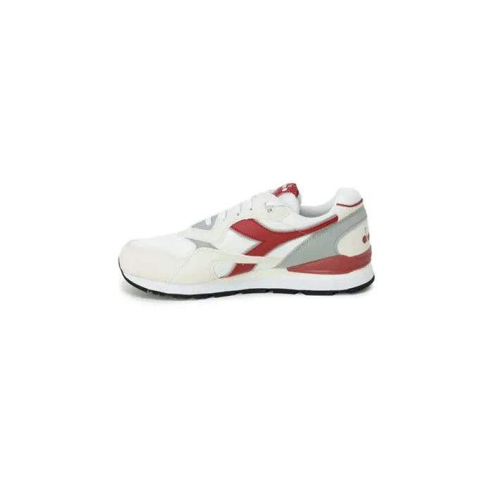 Athletic sneaker in white, red, and gray with distinctive logo by Diadora