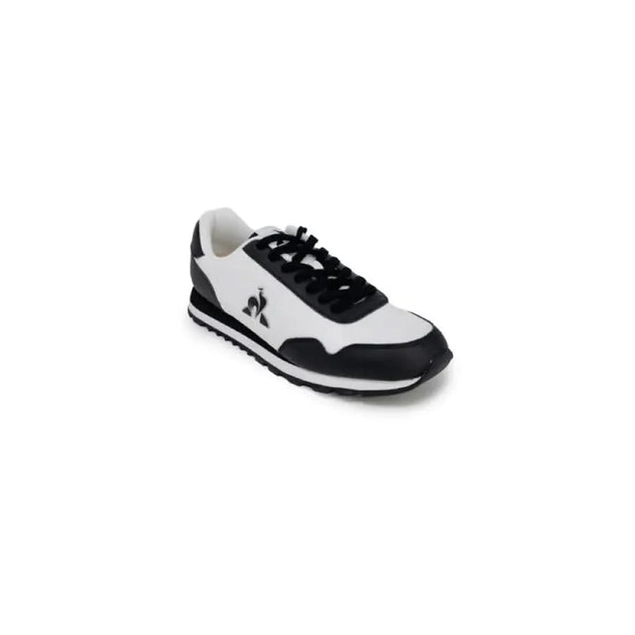 Athletic sneaker in white and black color scheme with logo from Le Coq Sportif