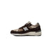 New Balance Men Sneakers featuring a stylish brown and beige color scheme