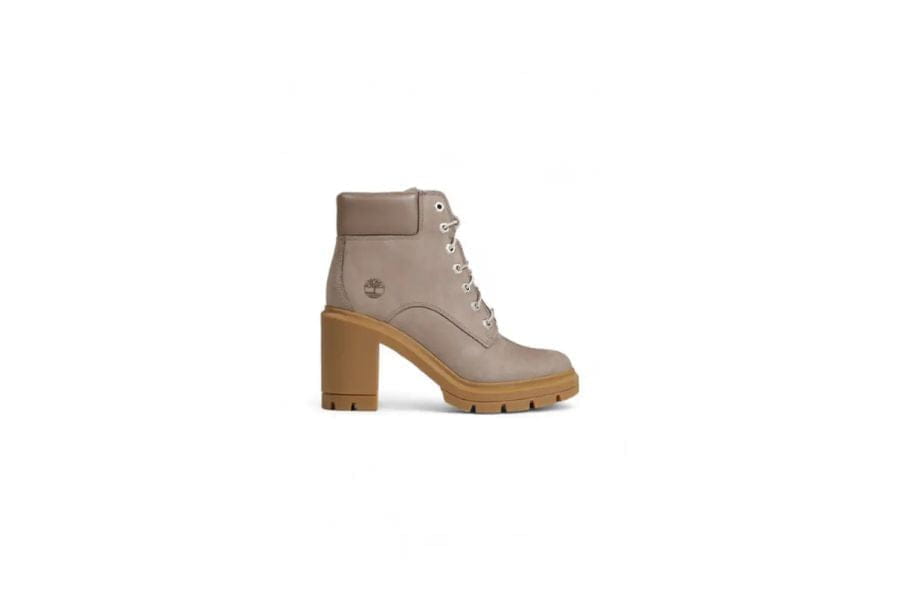 Beige leather ankle boot with chunky heel, perfect for summer work outfits and stylish apparel.