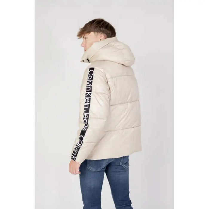 Beige hooded puffer jacket with sleeve text from Calvin Klein Jeans for men