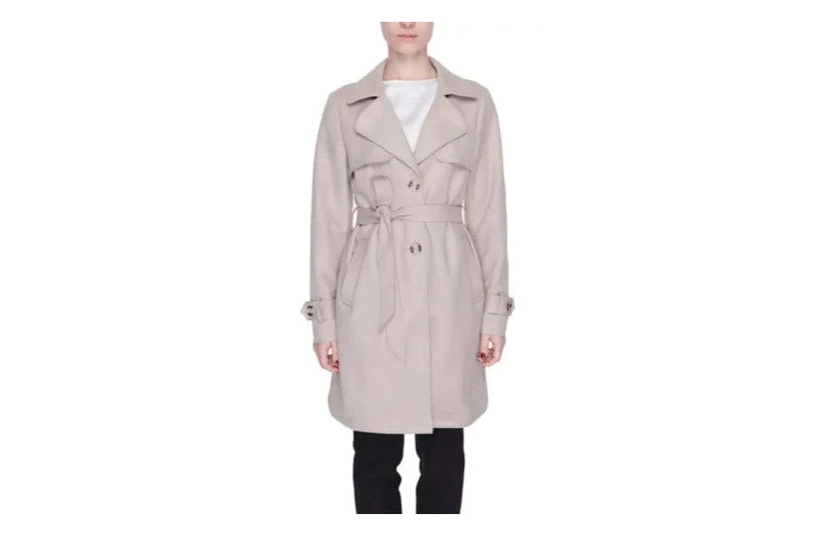 Beige trench coat with belt and double-breasted buttons for minimalist apparel and accessories.