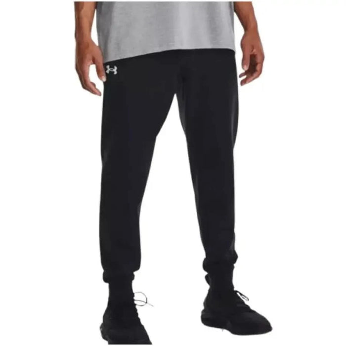 Black athletic jogger pants featuring Under Armour logo, ideal for active wear