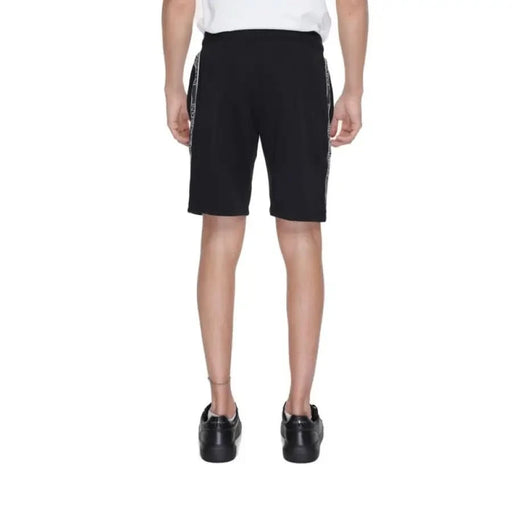 Emporio Armani black athletic shorts with white side stripes for men