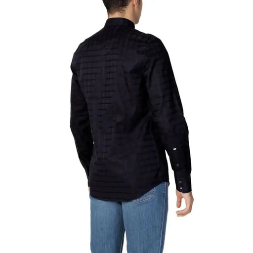 Antony Morato Men Shirt in black, paired with blue jeans, modeled for a stylish look