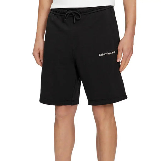 Black Calvin Klein Jeans shorts with drawstring waist for men by Calvin Klein Jeans