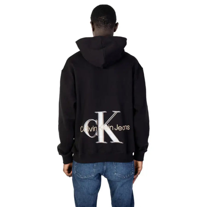 Black Calvin Klein Jeans hoodie with white logo on the back - Men’s Sweatshirt