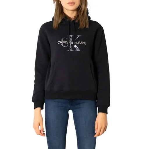 Black Calvin Klein Jeans hoodie with white logo print - Women Sweatshirts by Calvin Klein Jeans