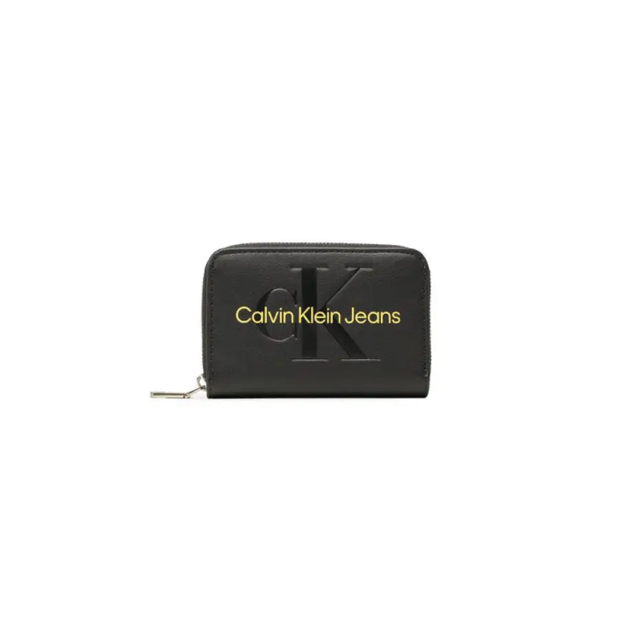 Black Calvin Klein Jeans wallet with gold lettering and zipper closure