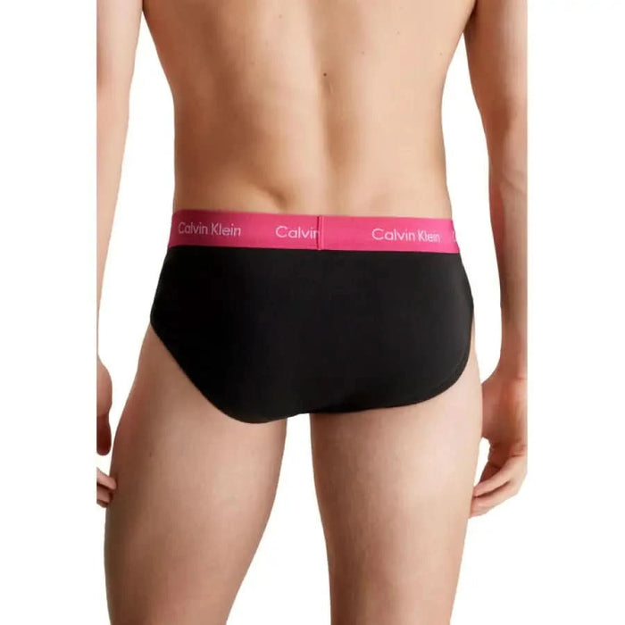 Black Calvin Klein men’s briefs with pink waistband from Calvin Klein Men Underwear collection