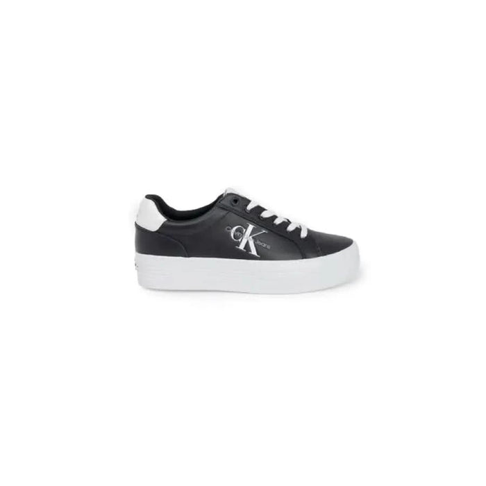 Black Calvin Klein platform sneaker with white sole and laces for women