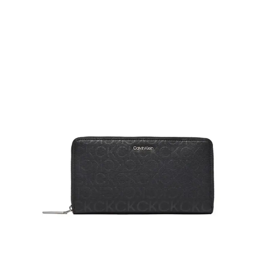 Black Calvin Klein zip-around wallet featuring an embossed logo pattern for women