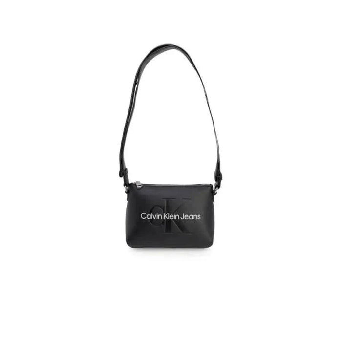 Black Calvin Klein Jeans crossbody bag with adjustable strap for women