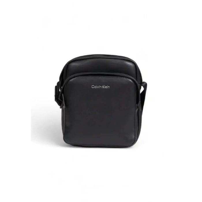 Black Calvin Klein crossbody bag with adjustable strap and single compartment design