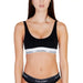 Black Calvin Klein sports bra and underwear set with white logo band detailing