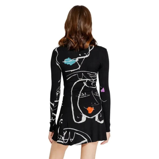 Black cardigan sweater with abstract cat designs in white and colorful accents by Desigual