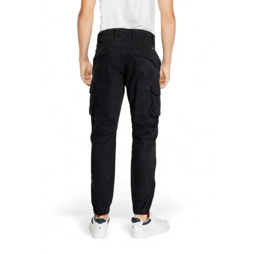 Black cargo pants with multiple pockets and elastic cuffs by Gas - Gas Men Trousers