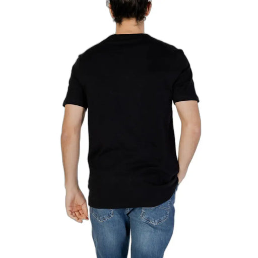 Black crew neck t-shirt paired with blue jeans from Boss - Boss Men T-Shirt collection