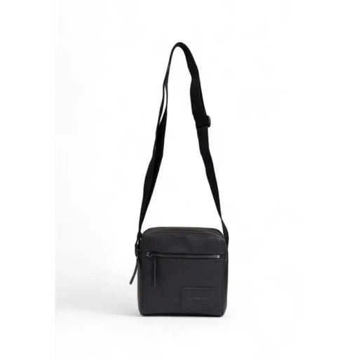 Black Calvin Klein crossbody bag with zipper and adjustable strap for men