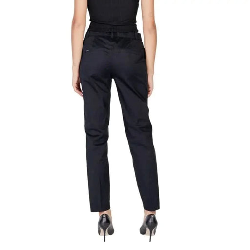 Black tapered leg dress pants with back pockets from Street One Women Trousers