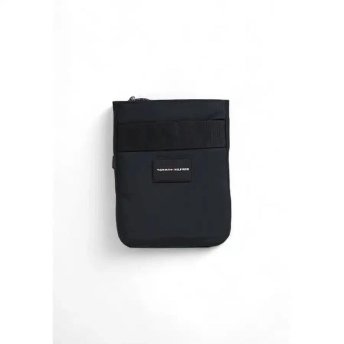 Black Tommy Hilfiger pouch wallet with a zipper and small label for men