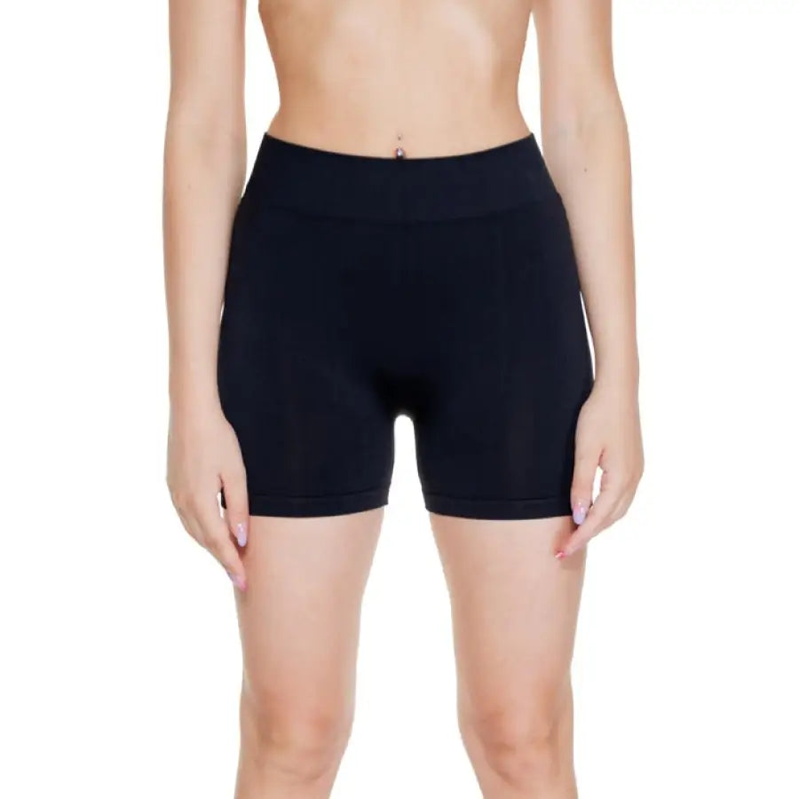 Slim torso model in black fitted Vero Moda athletic shorts for women
