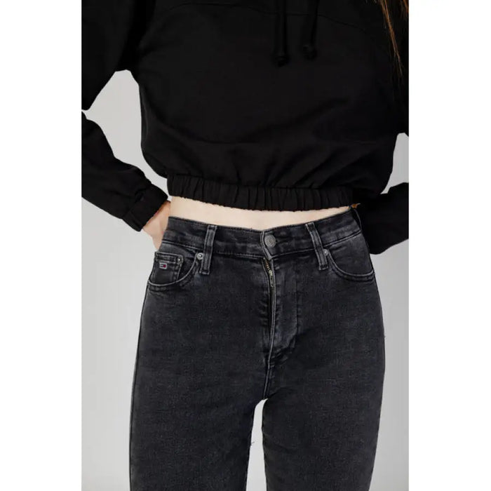 Black high-waisted Tommy Hilfiger Jeans for women featuring waistband and pocket detail