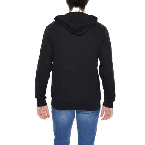 Emporio Armani Men Sweatshirt in Black, worn with Blue Jeans, viewed from behind