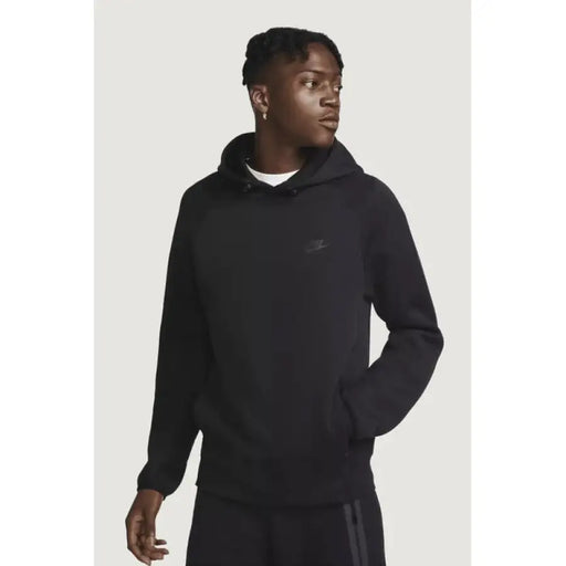 Nike Men Sweatshirts - Black hooded sweatshirt modeled against a plain background