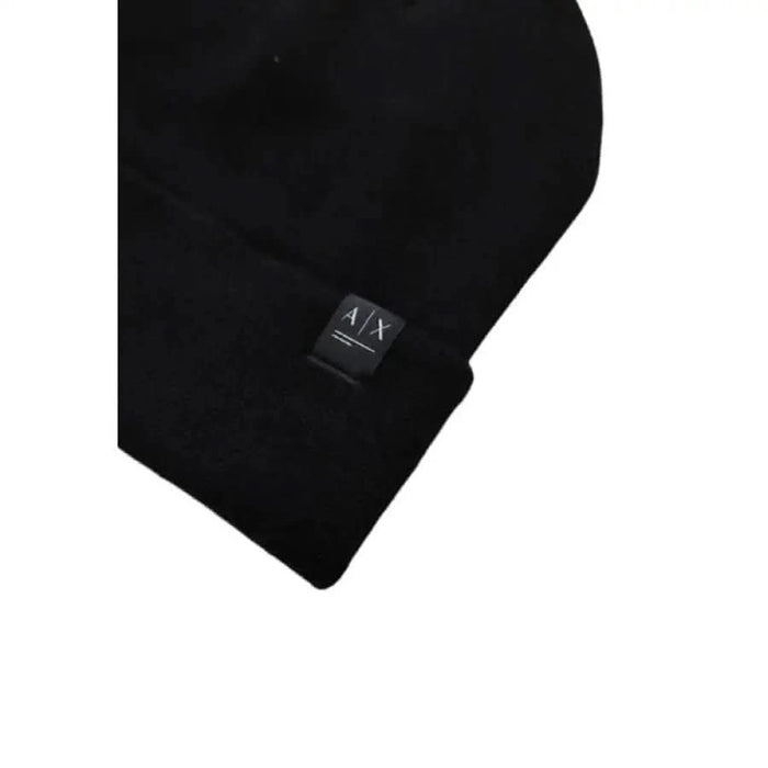 Black knit beanie featuring a small A/X logo patch from Armani Exchange Men Cap