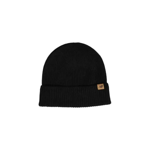 Black knit beanie with brown leather tag from New Balance Men Cap collection