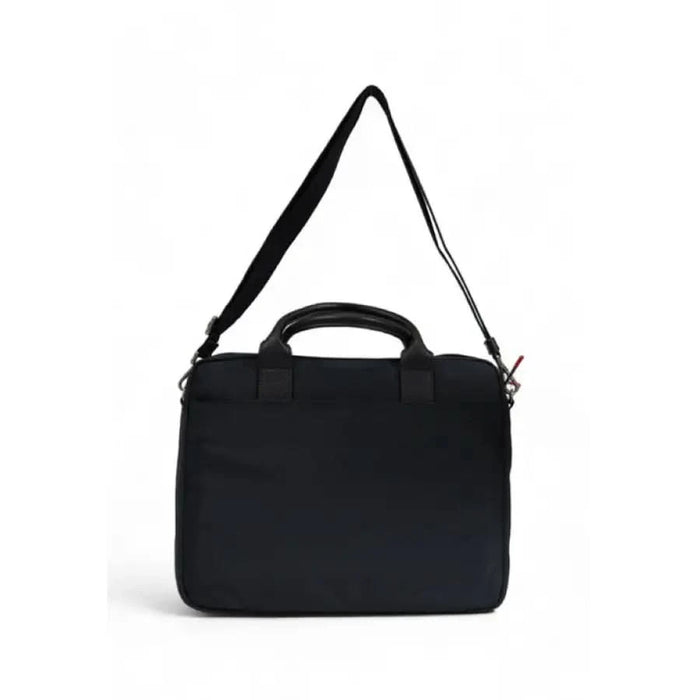 Black Tommy Hilfiger men bag with handles and shoulder strap for versatile carrying