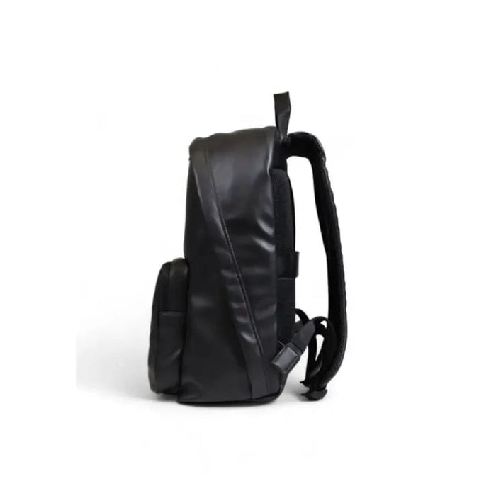 Black leather backpack by Tommy Hilfiger with padded straps and side pockets