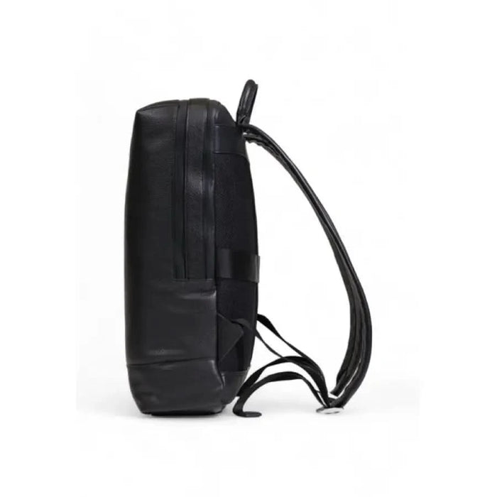 Black leather backpack with minimalist design by Tommy Hilfiger for men