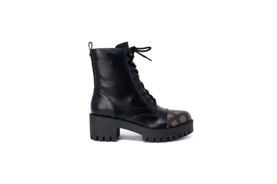 Black leather combat boot with chunky sole and metal studs for retro fashion style.