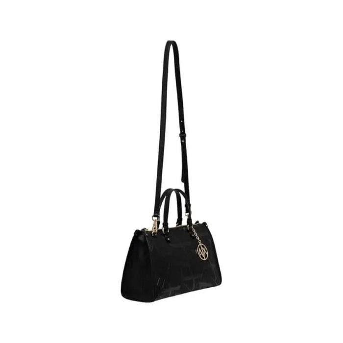 Black leather handbag with shoulder strap and top handles by Armani Exchange