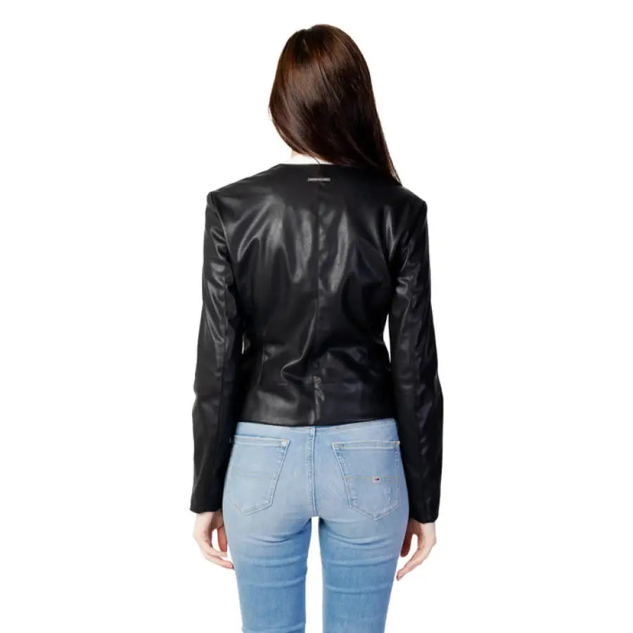 
                      
                        Armani Exchange black leather jacket with light blue jeans, back view, women’s blazer
                      
                    