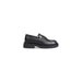 Tommy Hilfiger women’s black leather penny loafer with chunky sole moccassin