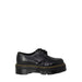 Dr. Martens women’s black leather platform shoe with chunky sole and yellow stitching