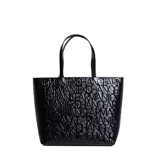 Black leather tote bag featuring embossed Armani Exchange logo pattern for women