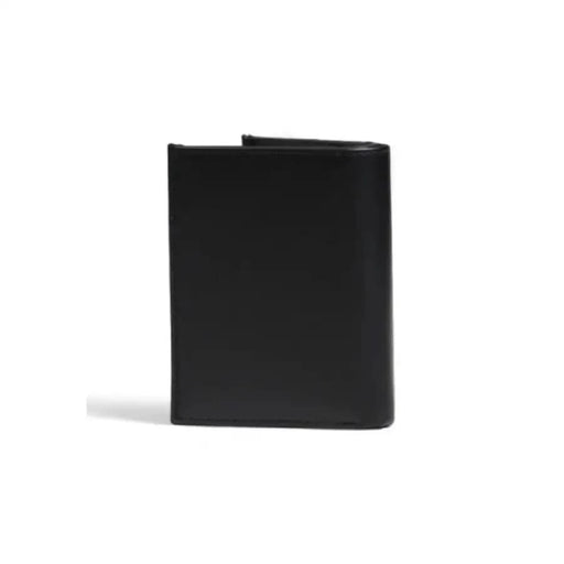 Black leather Calvin Klein billfold standing upright in the Calvin Klein Men Wallet collection