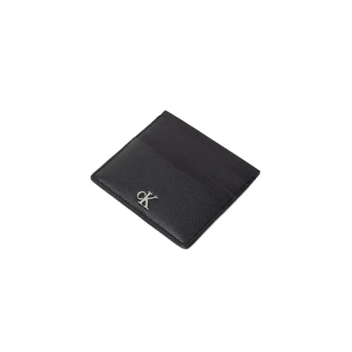 Calvin Klein Men’s black leather wallet featuring a sleek ’ck’ logo