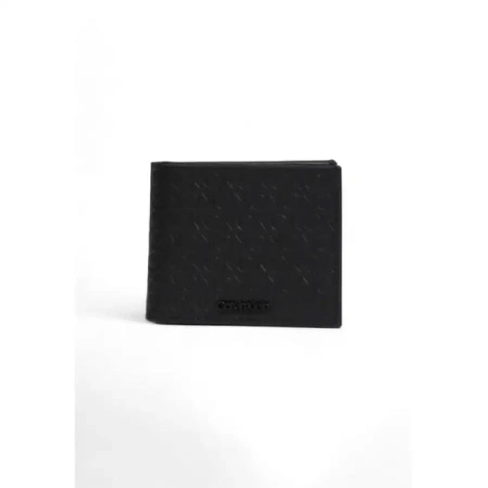 Calvin Klein Men Wallet - Black textured leather wallet with visible brand name