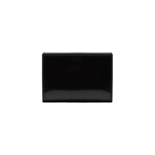 Black leather minimalist wallet by Calvin Klein showcasing elegant design and functionality