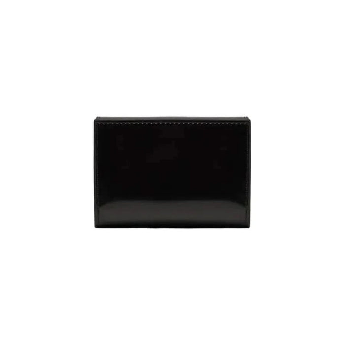 Black leather minimalist wallet by Calvin Klein showcasing elegant design and functionality