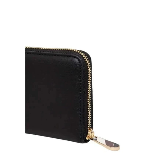 Black leather Tommy Hilfiger women wallet with gold zipper closure