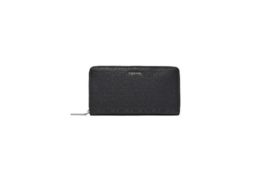 Black leather zip-around wallet with Calvin Klein logo ideal for summer outfit ideas.