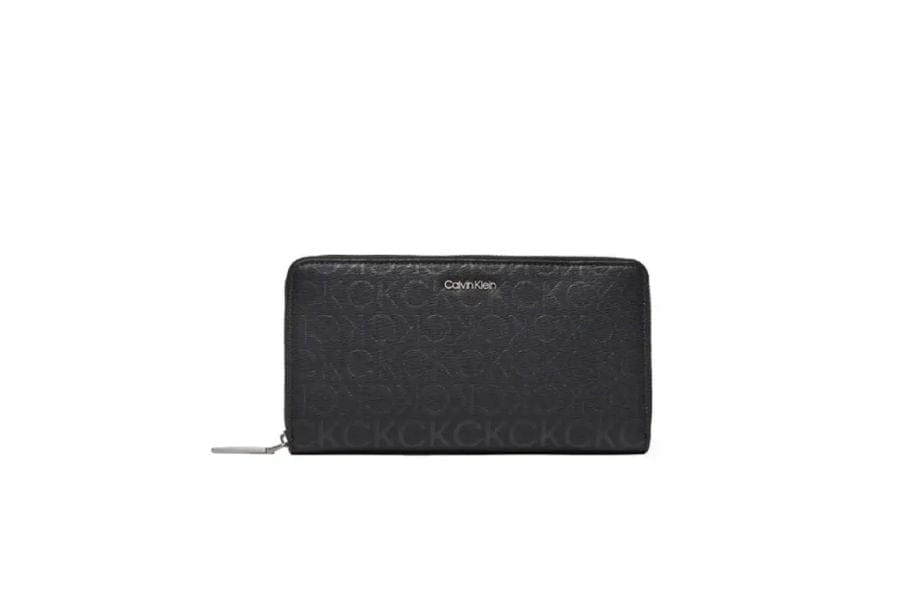 Black leather zip-around wallet with Calvin Klein logo for summer work outfits chic looks.