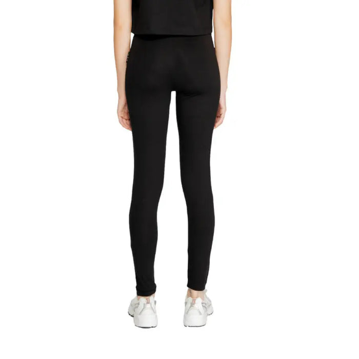 Black leggings worn by a model showcasing Icon Women Trousers for stylish comfort