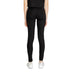 Black leggings worn by a model showcasing Icon Women Trousers for stylish comfort